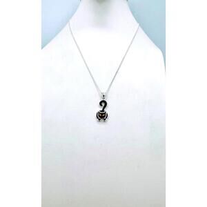 Kohls sterling silver black enameled cat with orange eyes pendant necklace